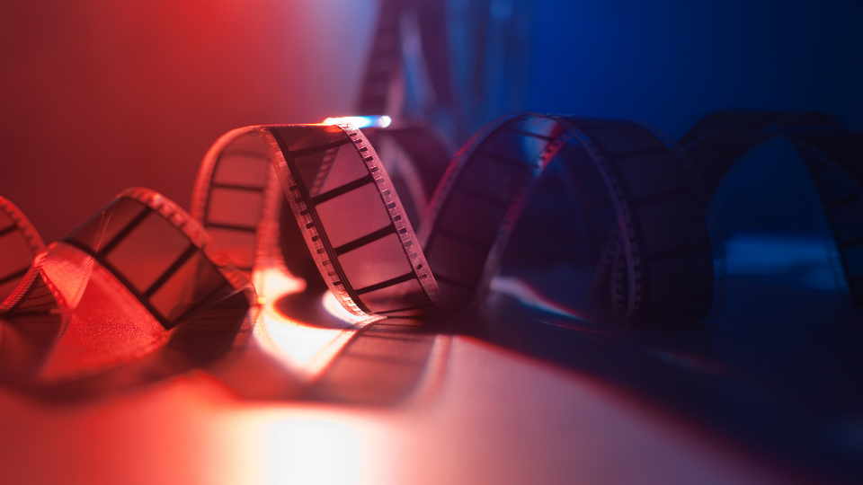 Spiral roll of film with colourful ambient light
